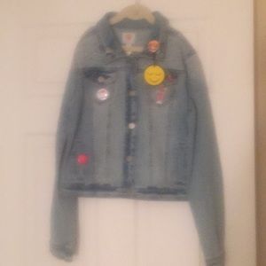 NWOT light blue girls jean jacket w/studs & pins.